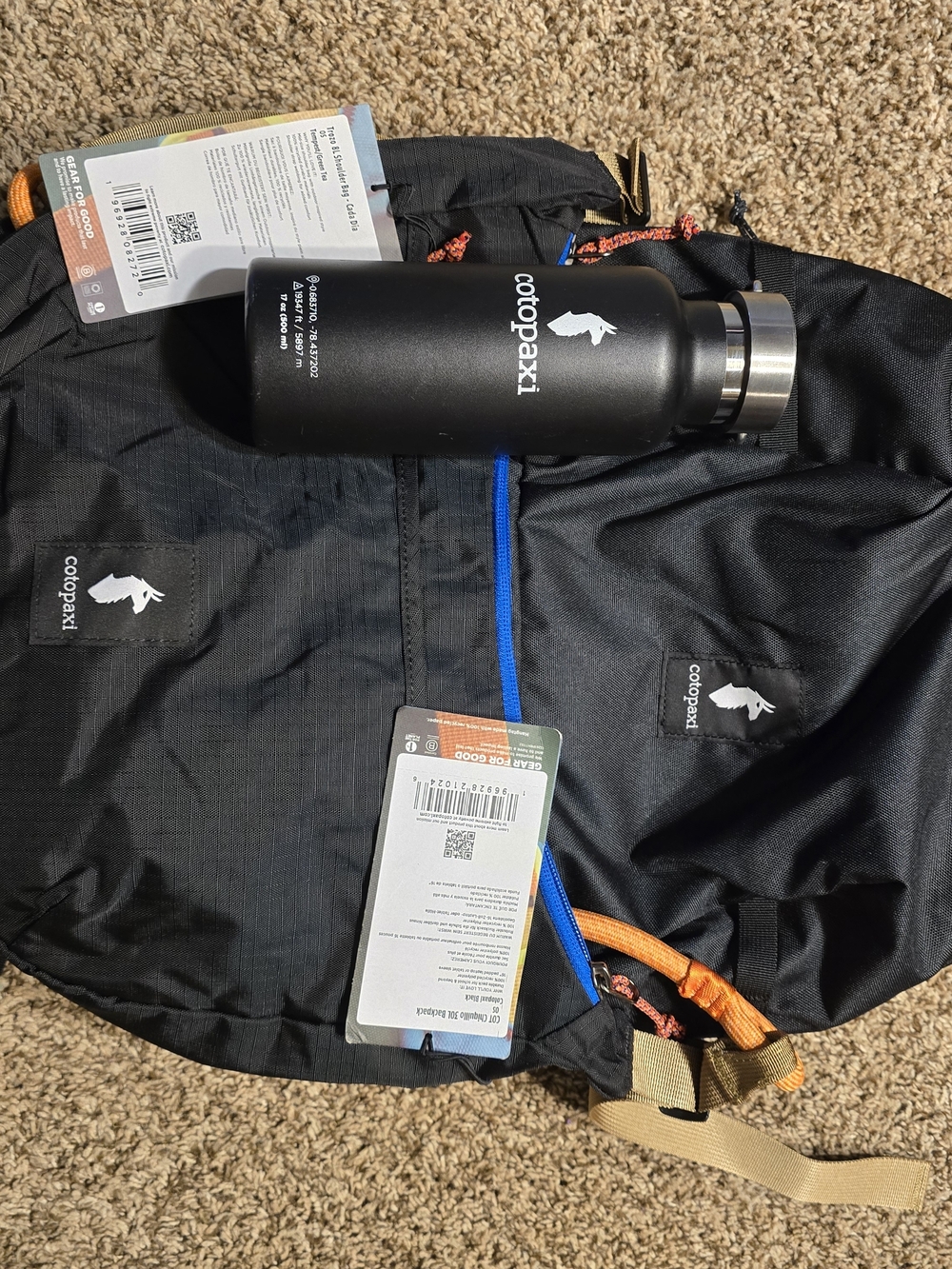 cotopaxi Black Water Bottle & Black Cotopaxi Back Pack Set. Trozo Sold